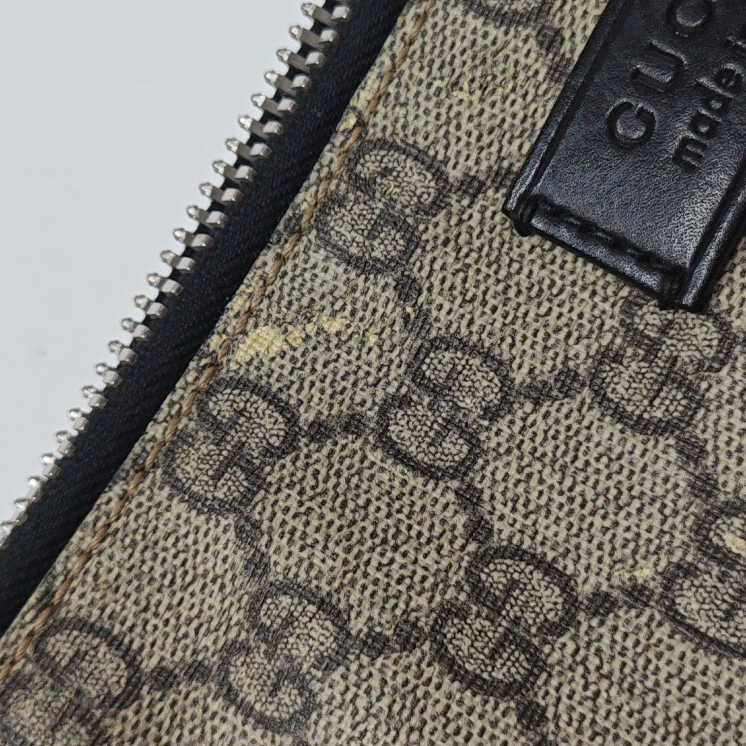 Monogram Coated Canvas Clutch Brown