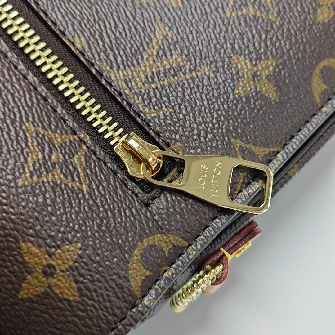MÉTIS MM Monogram Coated Canvas Brown