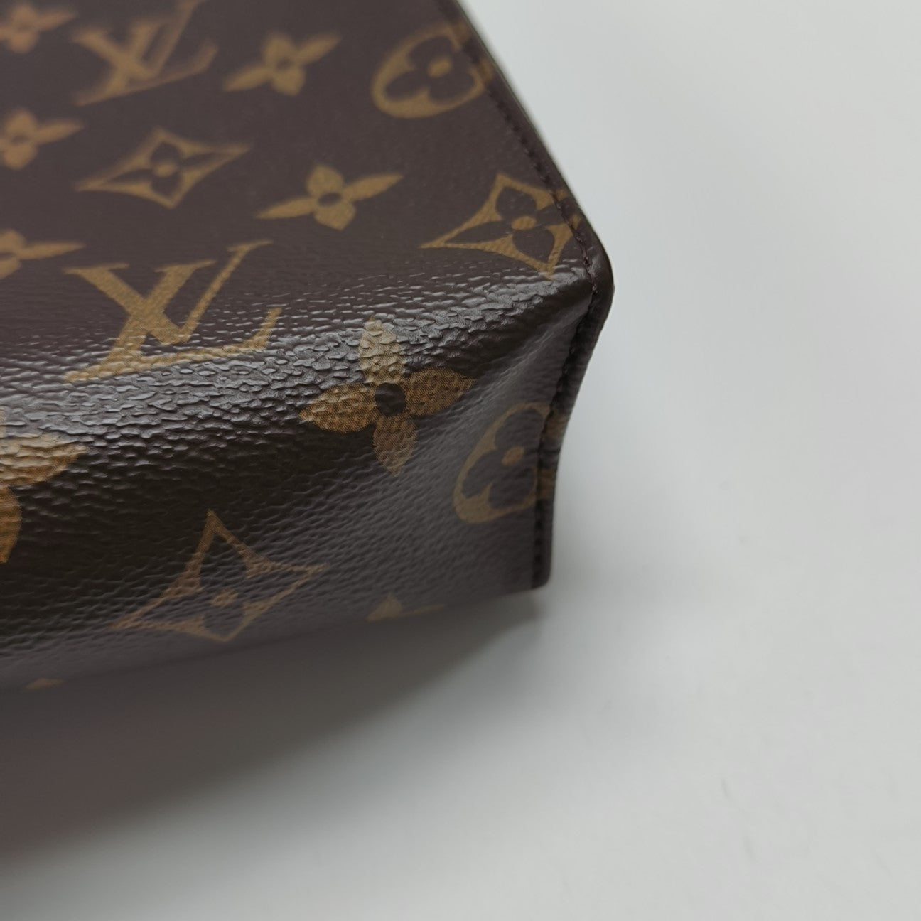 TOILET POCKET 26 Monogram Coated Canvas Brown
