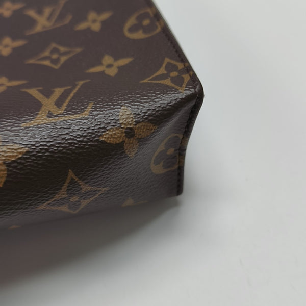TOILET POCKET 26 Monogram Coated Canvas Brown