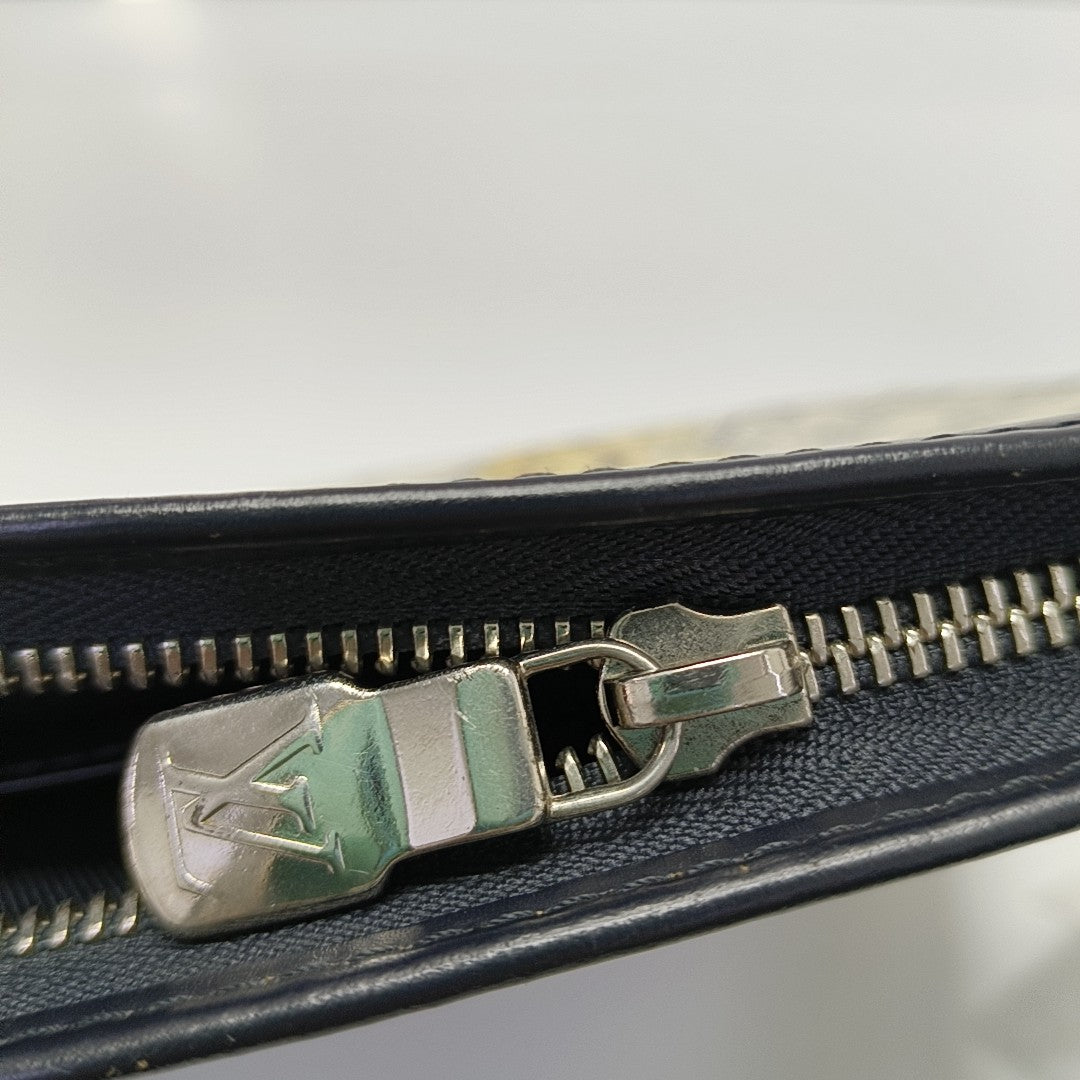Pochette Voyag MM Monogram Coated Canvas Gray