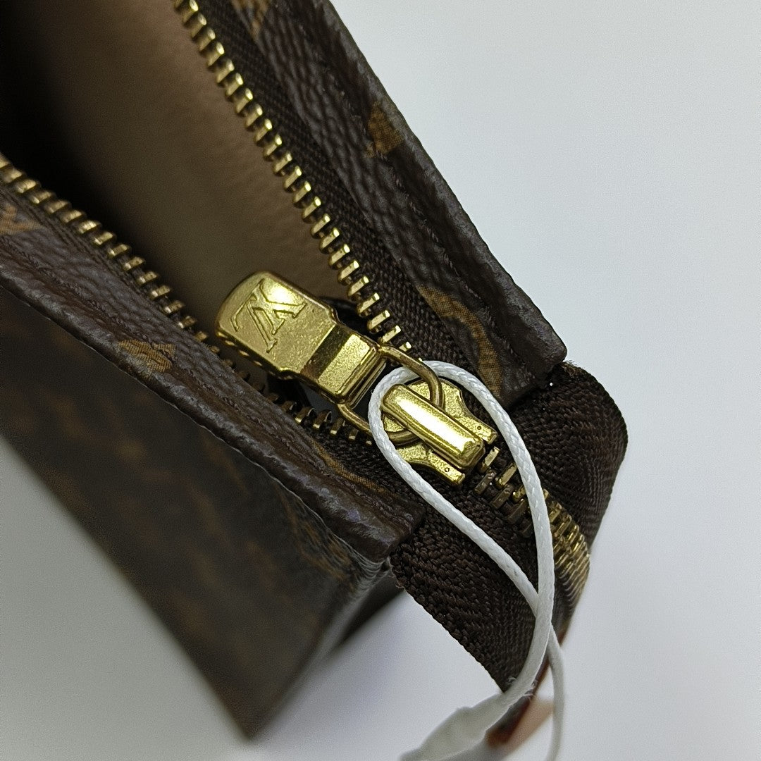 TOILET POCKET 26 Monogram Coated Canvas Brown
