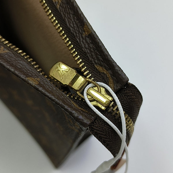 TOILET POCKET 26 Monogram Coated Canvas Brown