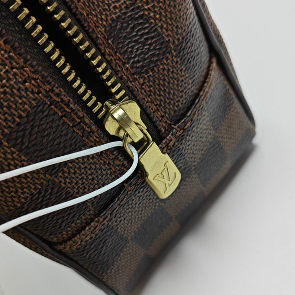 Damier Ebene Coated Canvas Clutch Brown