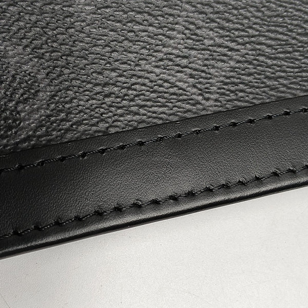 Pochette Voyag MM Monogram Coated Canvas Black