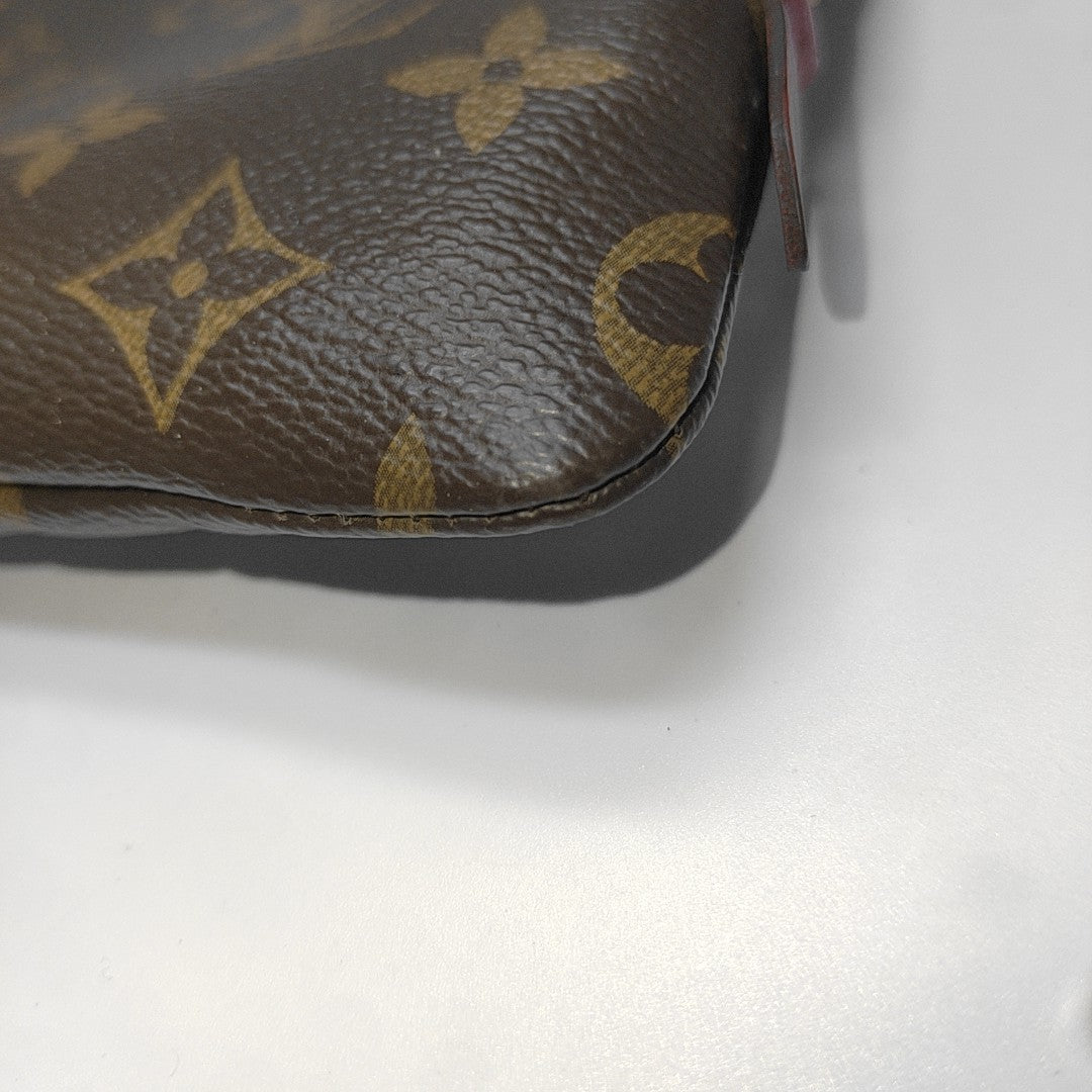 Etui Voyage PM Monogram Coated Canvas Brown