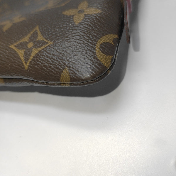Etui Voyage PM Monogram Coated Canvas Brown