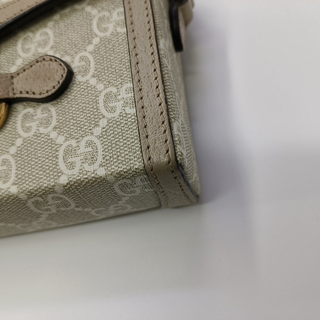 Authenticated pre-owned  Horsebit 1955 Mini Monogram Coated Canvas White - Shoulder Bag at Looply