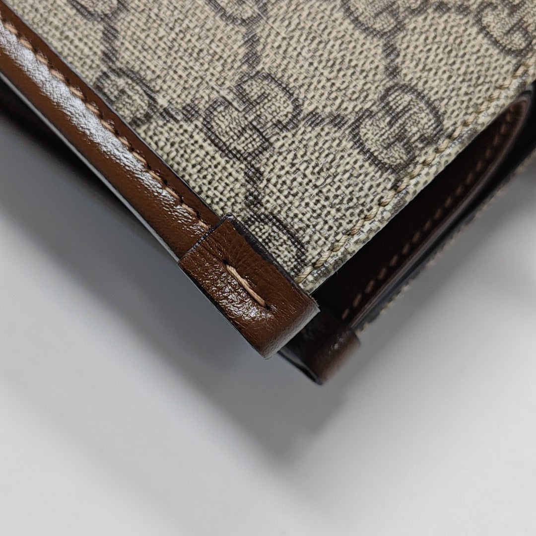 Retro Small Monogram Coated Canvas Brown