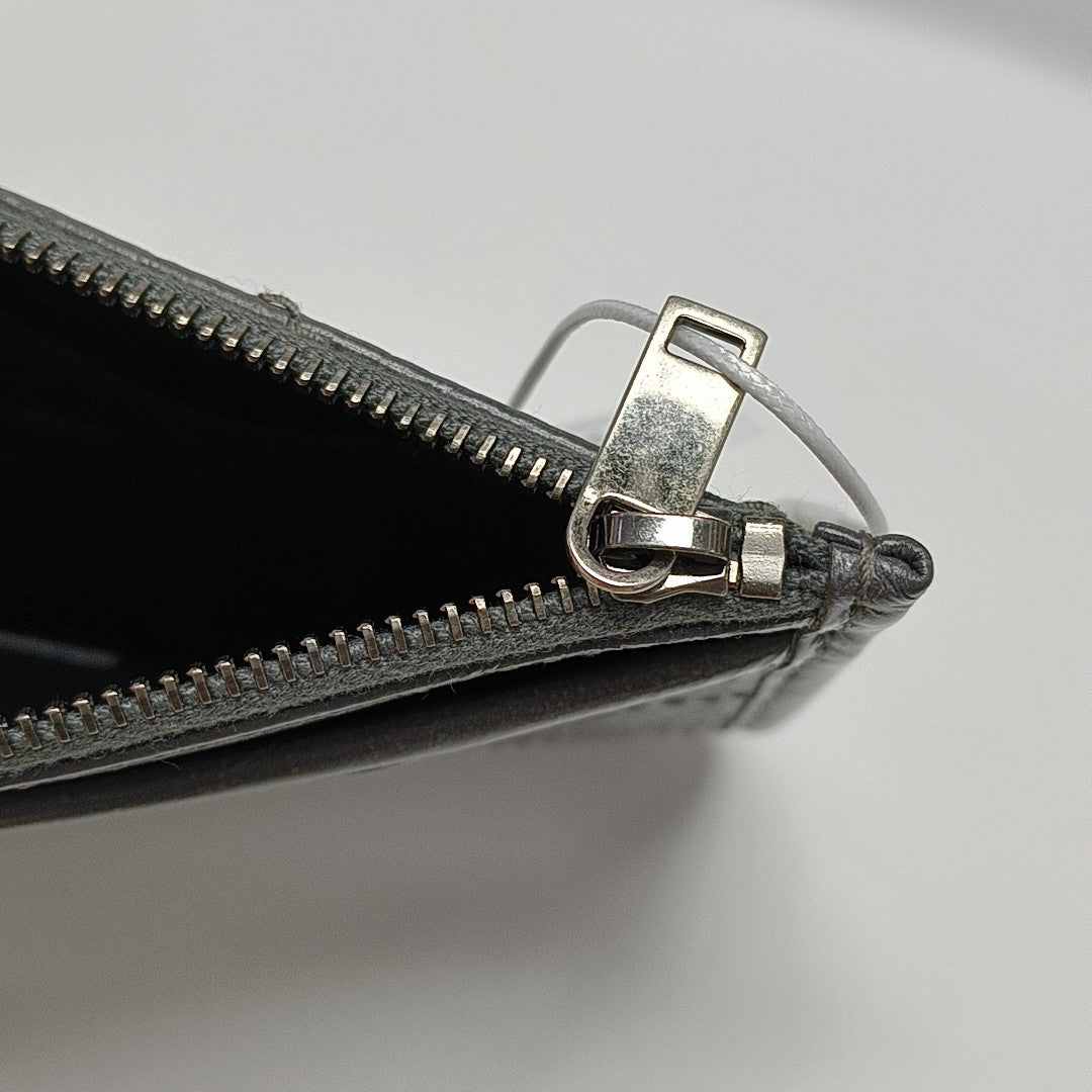 Authenticated pre-owned  CASSANDRE Chevron, Quilted Calfskin Gray - Clutch at Looply