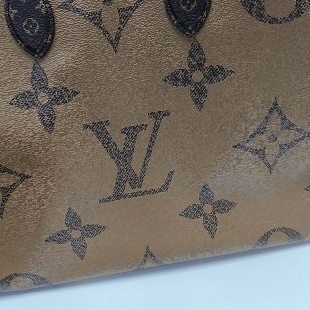 ONTHEGO GM Monogram Coated Canvas Brown