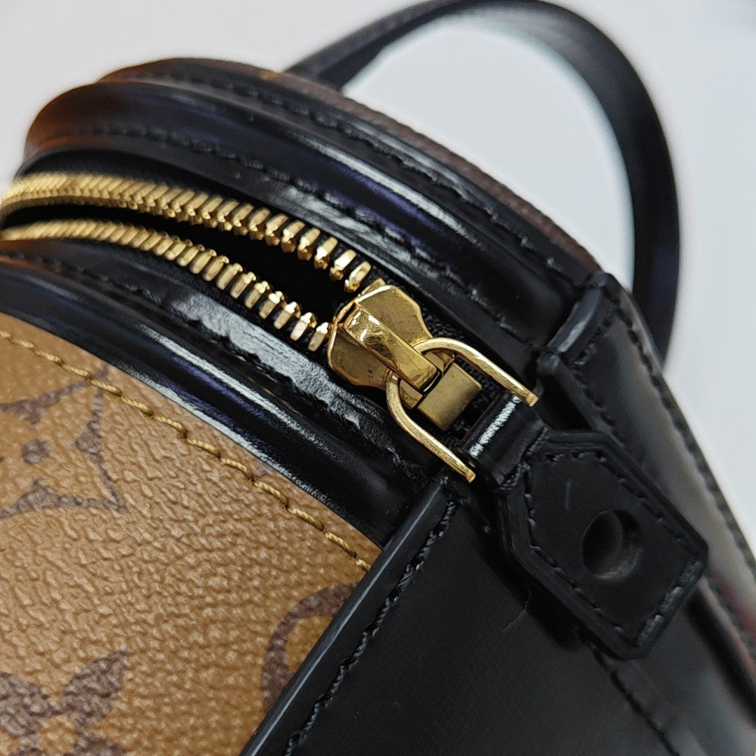 CANNES PM Monogram Coated Canvas Brown