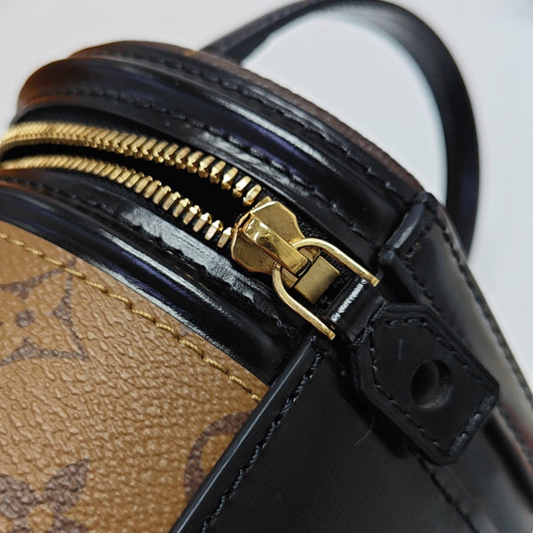 CANNES PM Monogram Coated Canvas Brown