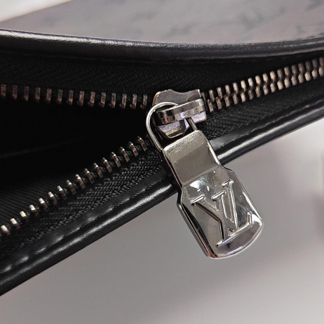 Pochette Voyag MM Monogram Coated Canvas Gray