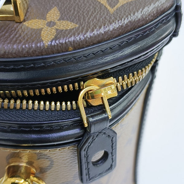 CANNES PM Monogram Coated Canvas Brown