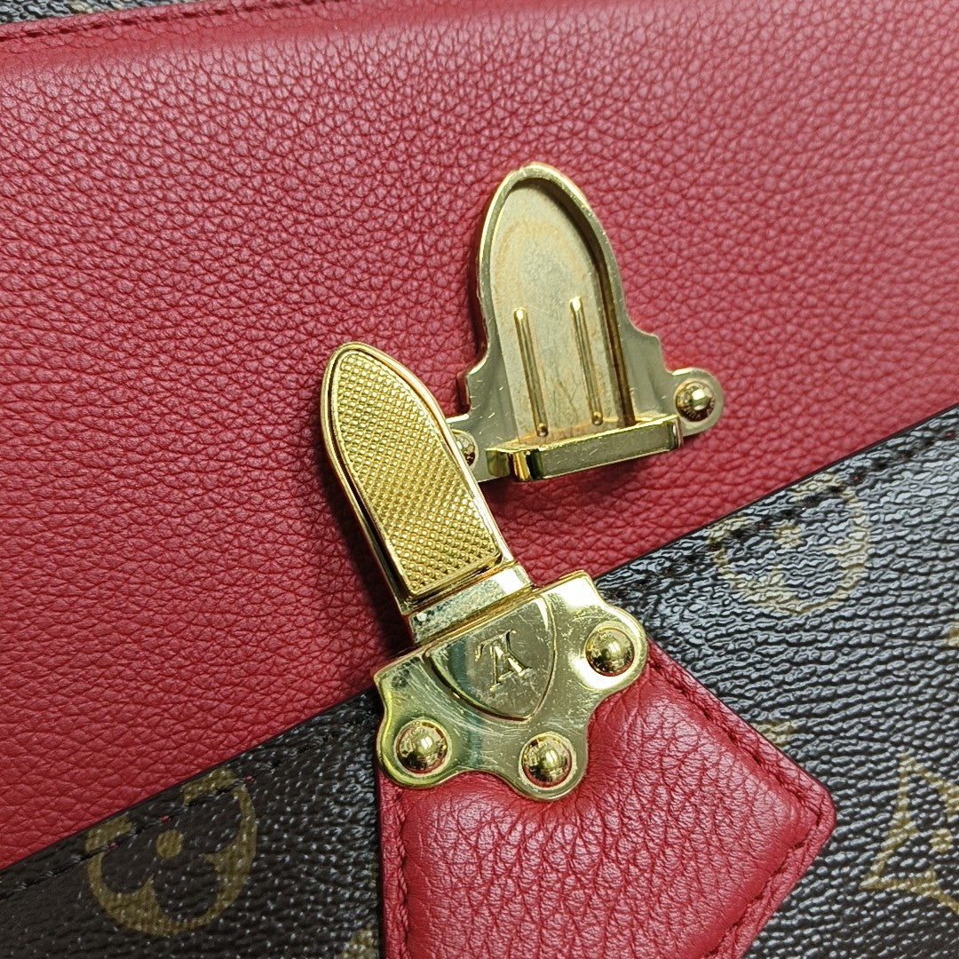 VICTOIRE Monogram Coated Canvas Brown