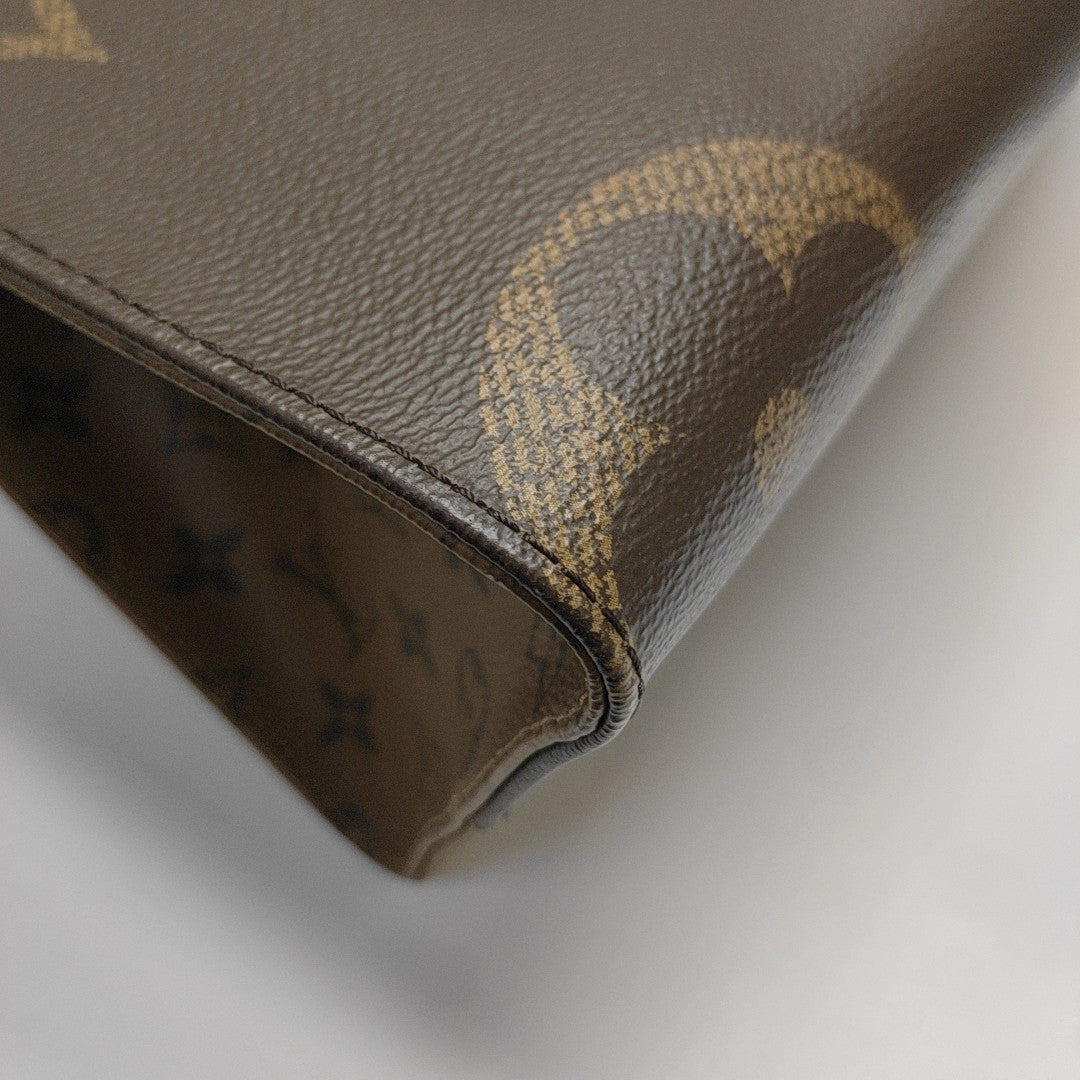 ONTHEGO MM Monogram Coated Canvas Brown