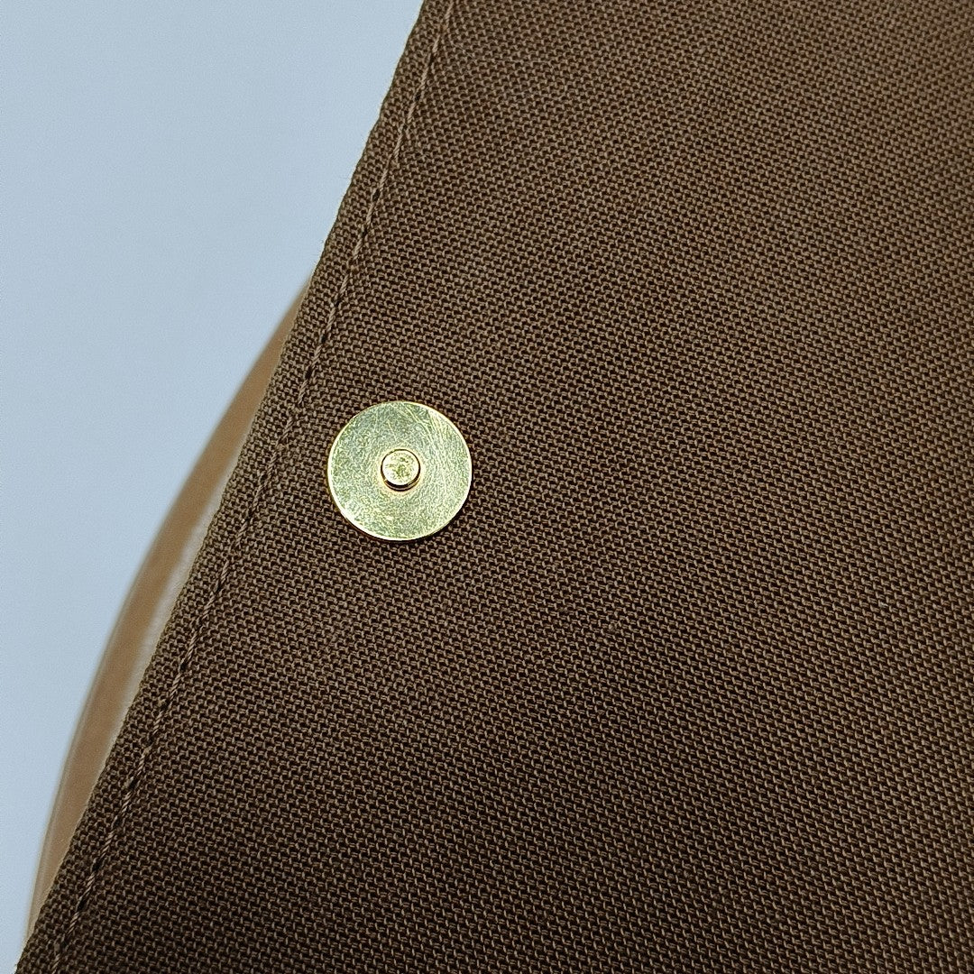 LOOPING PM Monogram Coated Canvas Brown