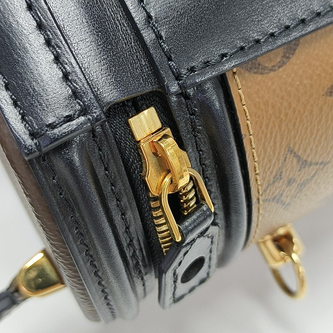 CANNES PM Monogram Coated Canvas Brown