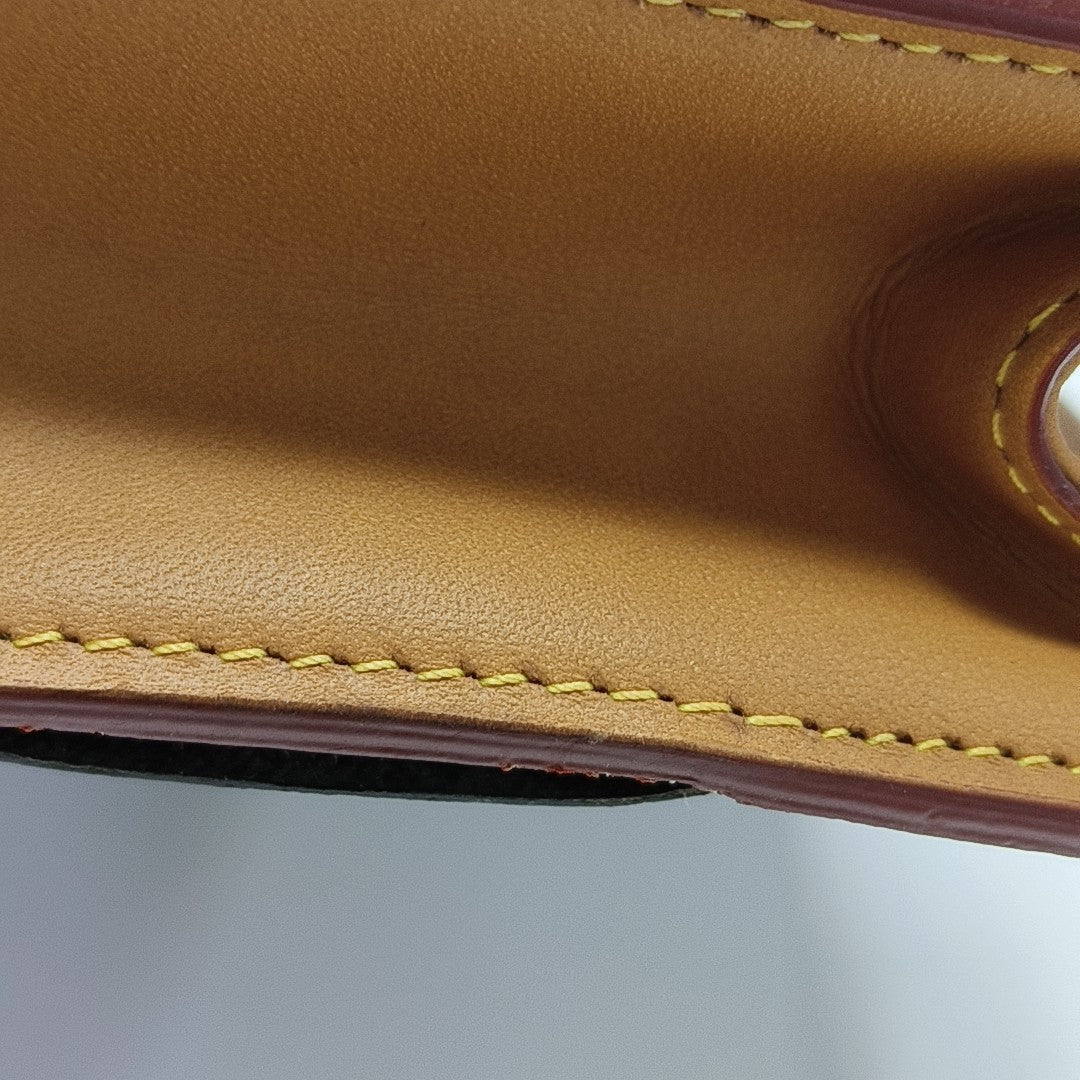 S LOCK Monogram Coated Canvas Brown