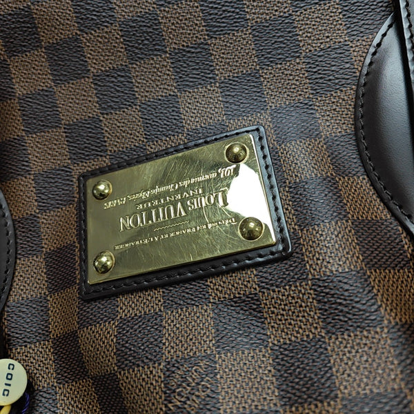 HAMPSTEAD GM Damier Ebene Coated Canvas Brown