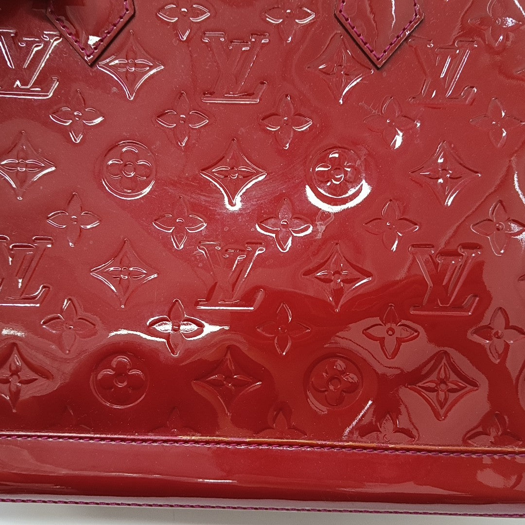 ALMA PM Piel Charol Monogram Roja