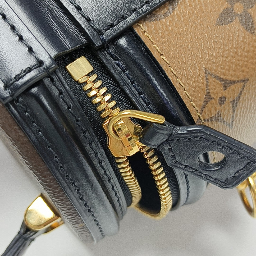 CANNES PM Monogram Coated Canvas Brown