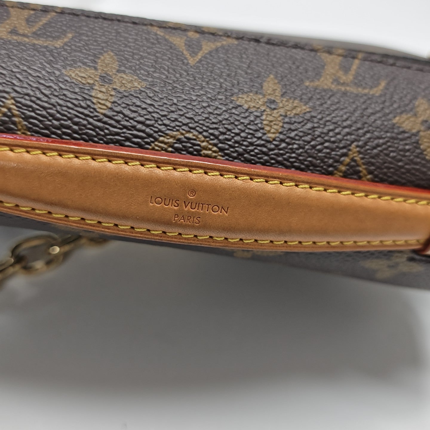 MÉTIS EAST WEST Monogram Coated Canvas Brown