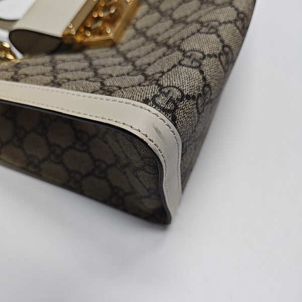 Padlock Small Monogram Coated Canvas Beige