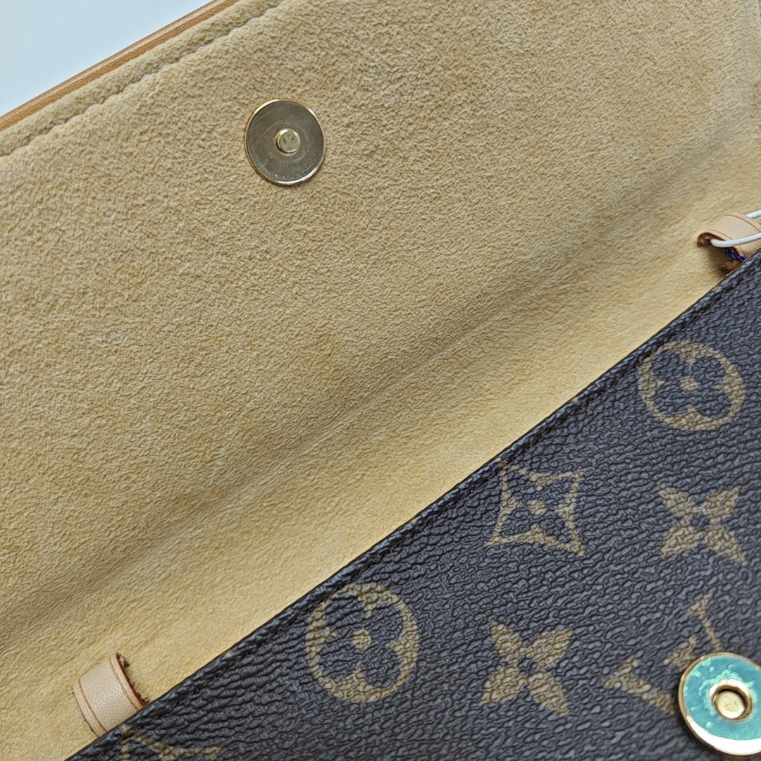 TWIN GM Monogram Coated Canvas Brown