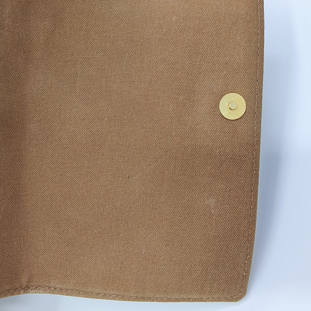 LOOPING PM Monogram Coated Canvas Brown