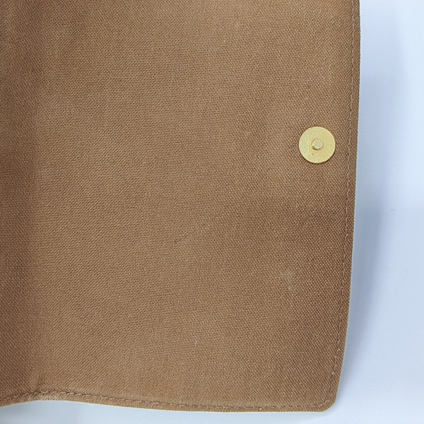 LOOPING PM Monogram Coated Canvas Brown