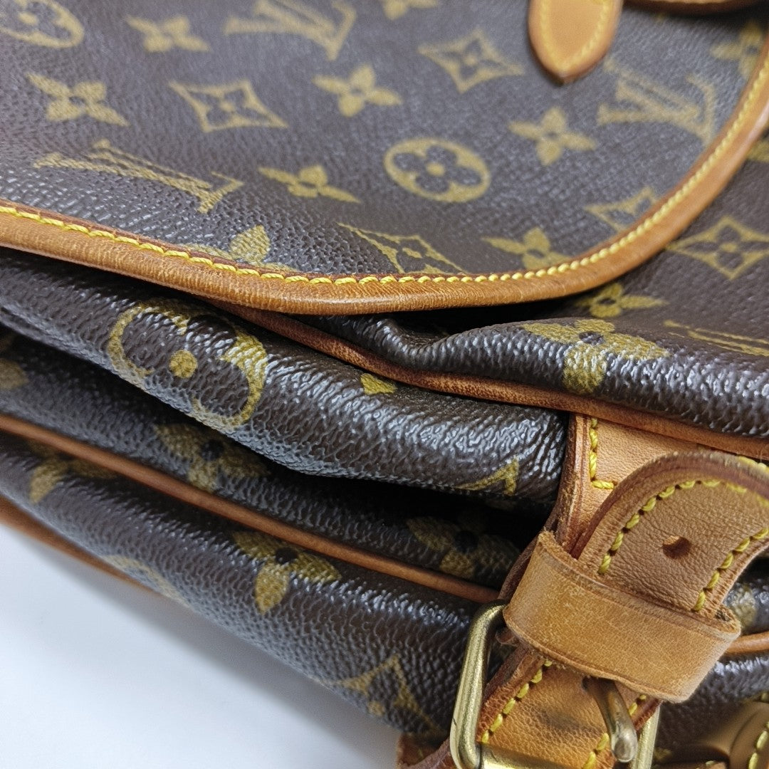 SAUMUR Monogram Coated Canvas Brown