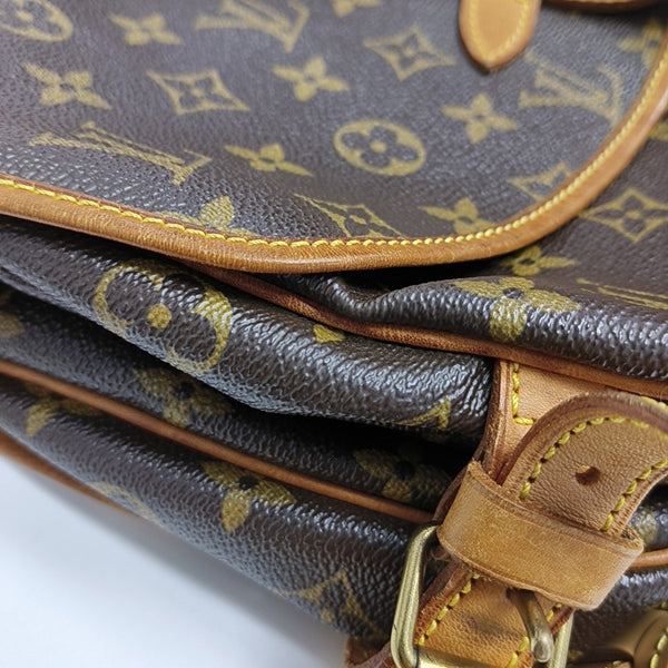 SAUMUR Monogram Coated Canvas Brown