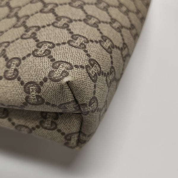 Monogram Coated Canvas Clutch Beige