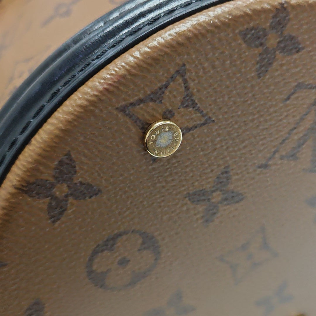 CANNES PM Monogram Coated Canvas Brown