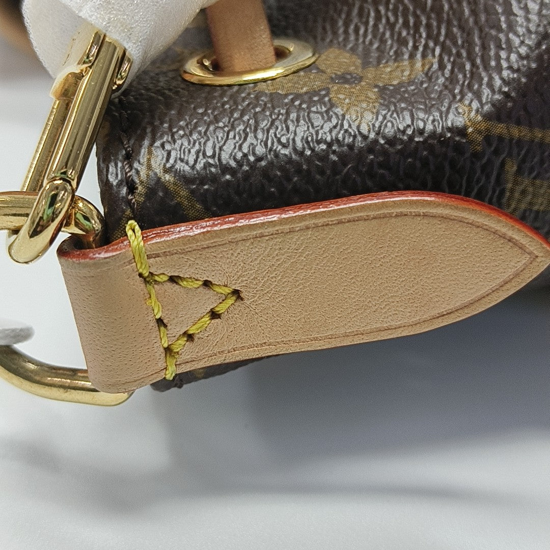 ODYSSEE Monogram Coated Canvas Brown