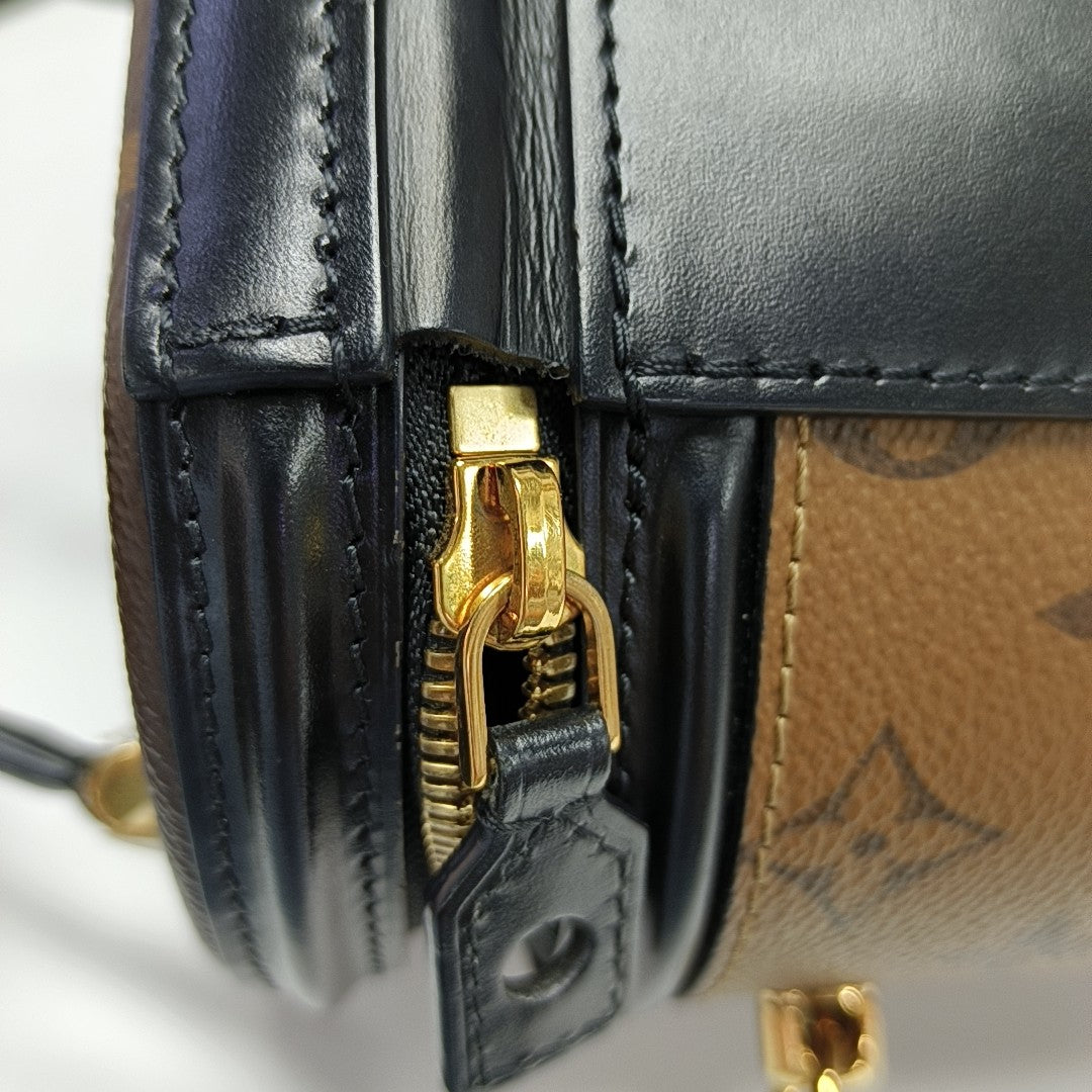 CANNES PM Monogram Coated Canvas Brown