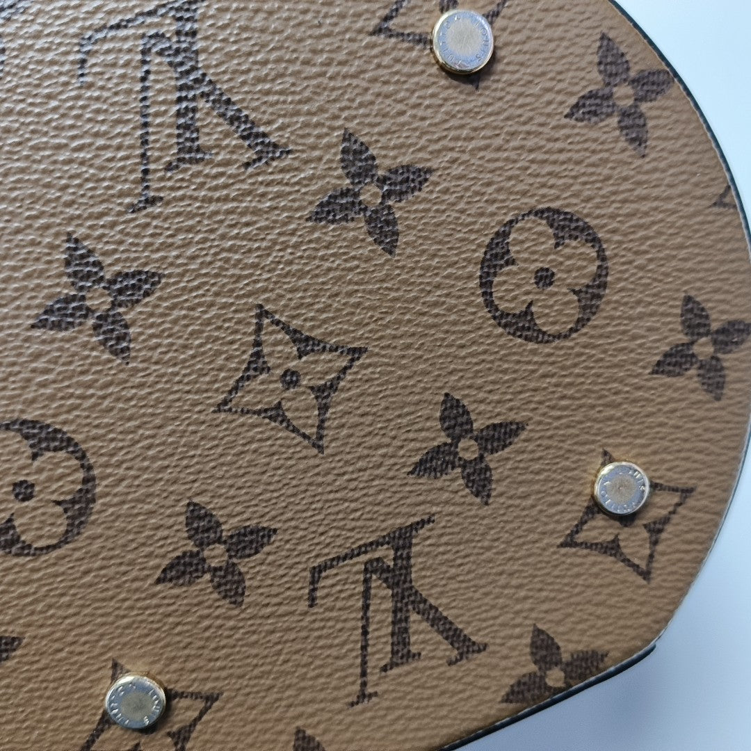 CANNES PM Monogram Coated Canvas Brown