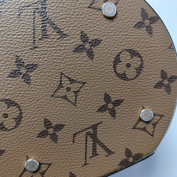 CANNES PM Monogram Coated Canvas Brown