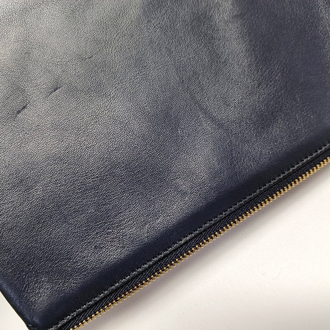 Authenticated pre-owned  TRIO Calfskin Black - Clutch at Looply