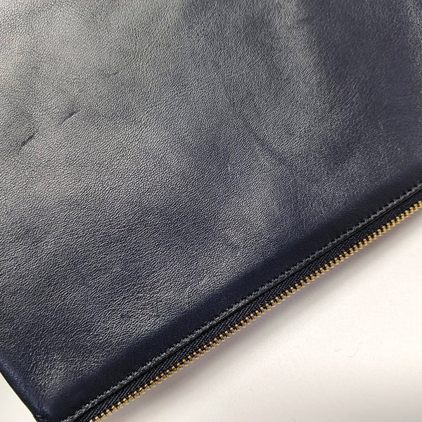 Authenticated pre-owned  TRIO Calfskin Black - Clutch at Looply