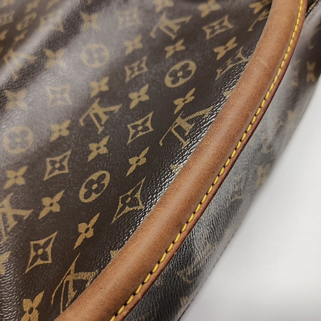 LOOPING PM Monogram Coated Canvas Brown