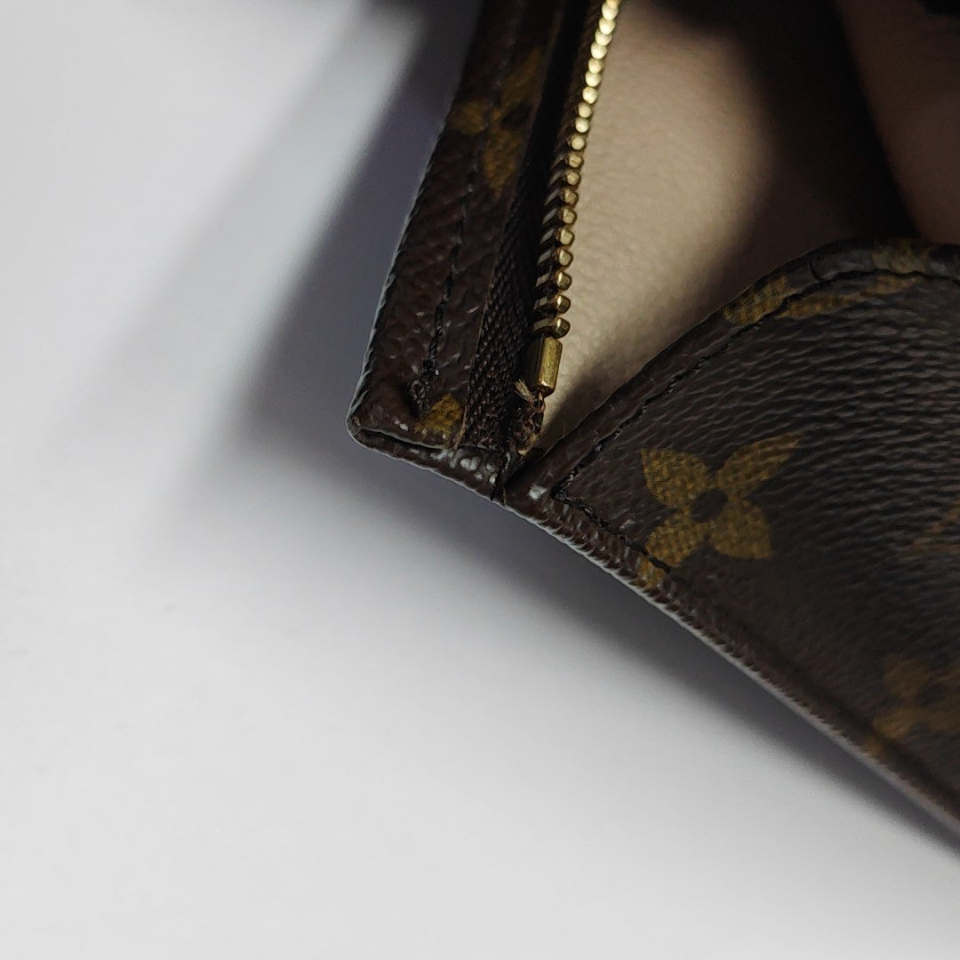 TOILET POCKET 19 Monogram Coated Canvas Brown