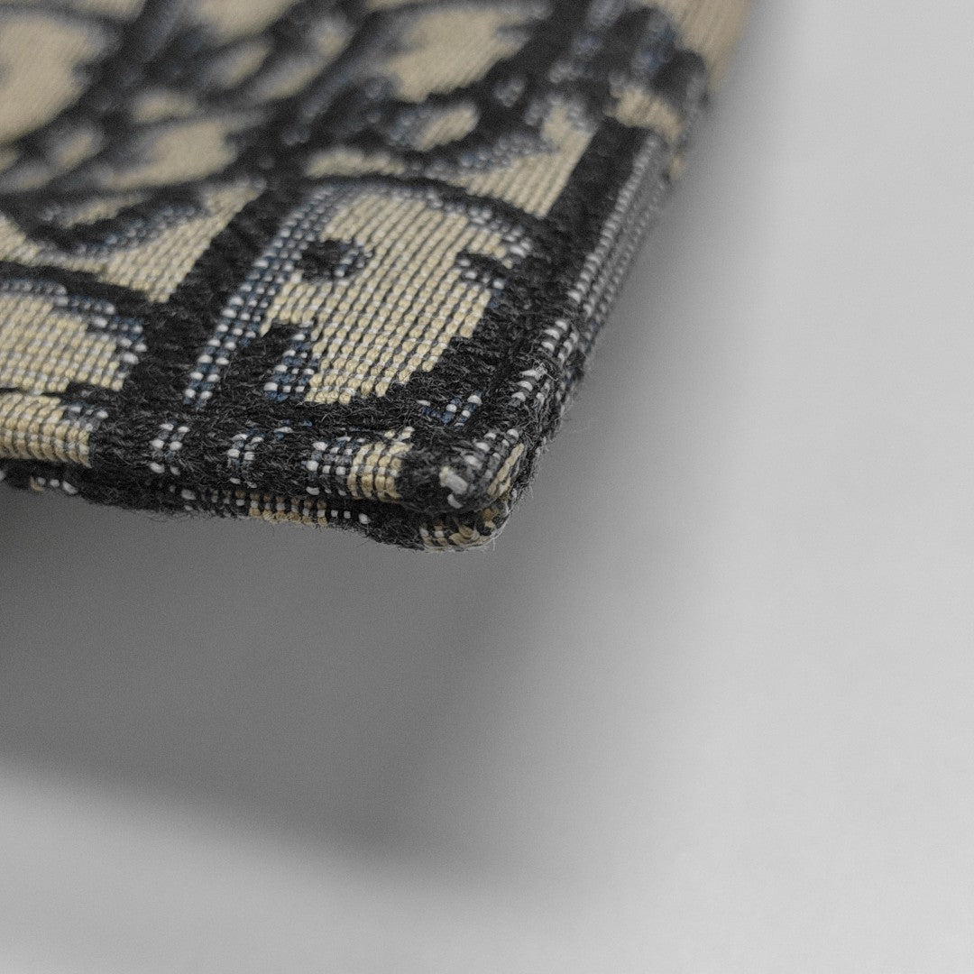 Oblique Canvas Clutch Blue