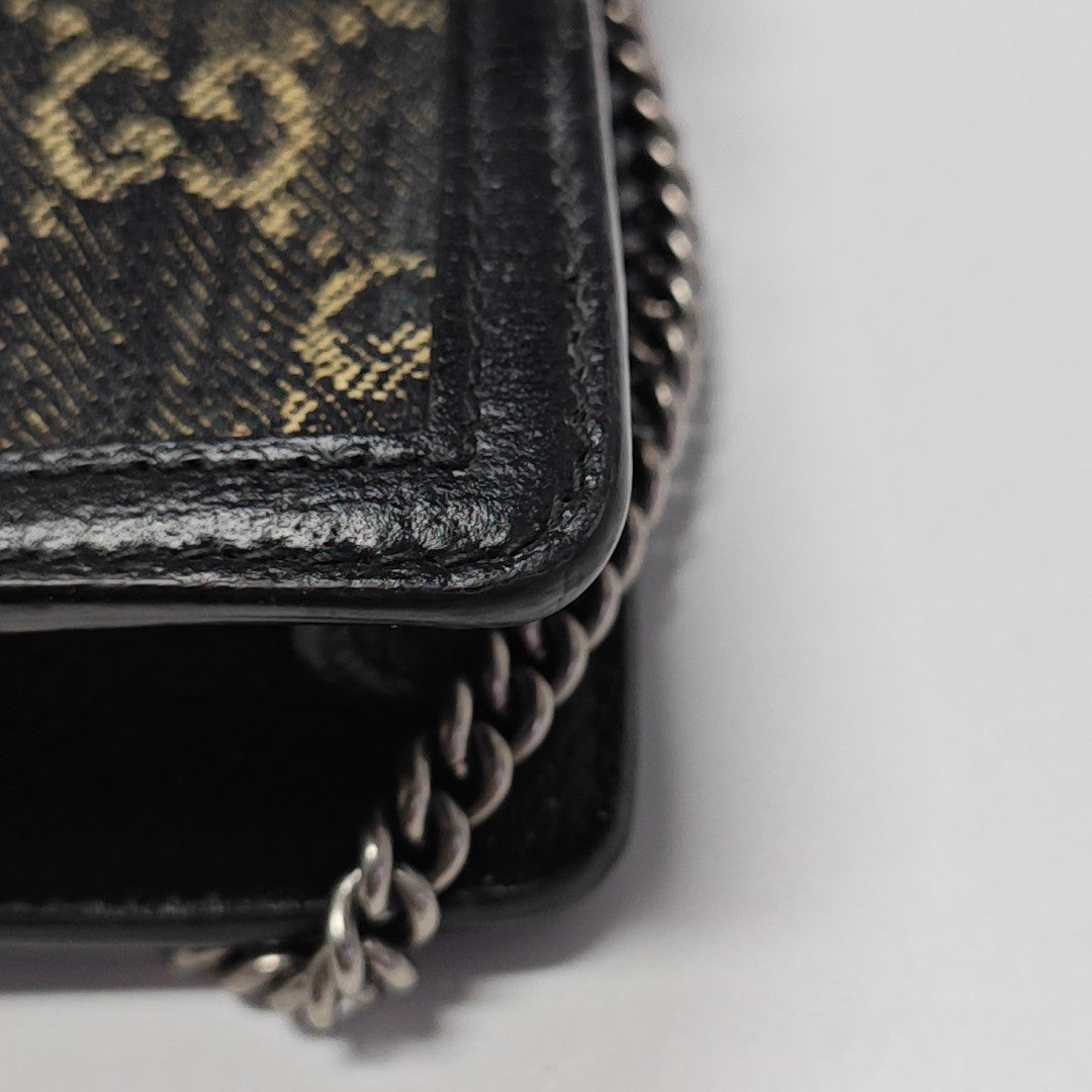 Authenticated pre-owned  Dionysus Super Mini Monogram Denim Black - Shoulder Bag at Looply
