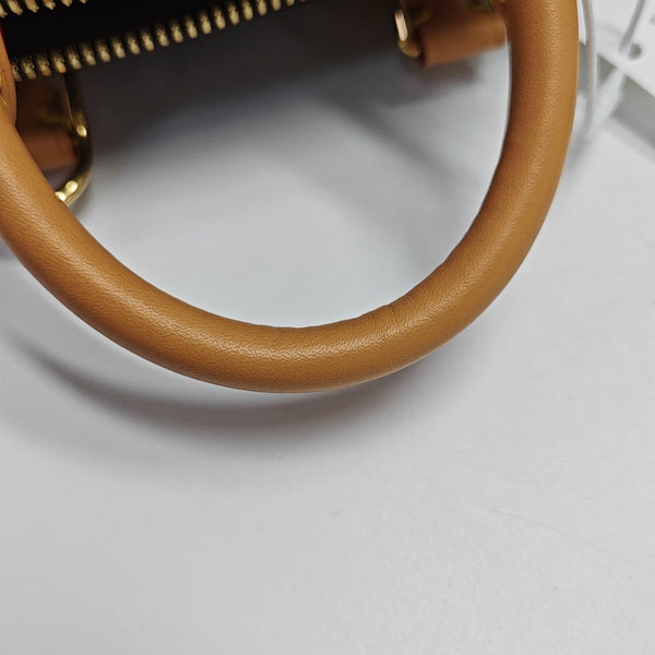 ALMA PM Monogram Coated Canvas Brown
