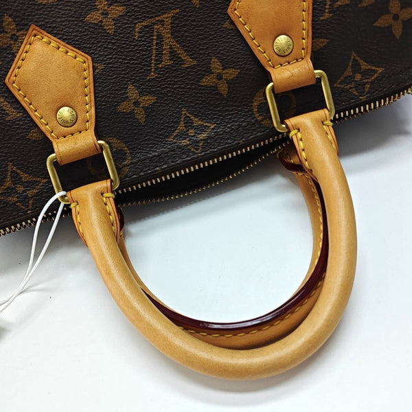 Authenticated pre-owned  SPEEDY 25 Monogram Coated Canvas Brown - Top Handle Bag at Looply