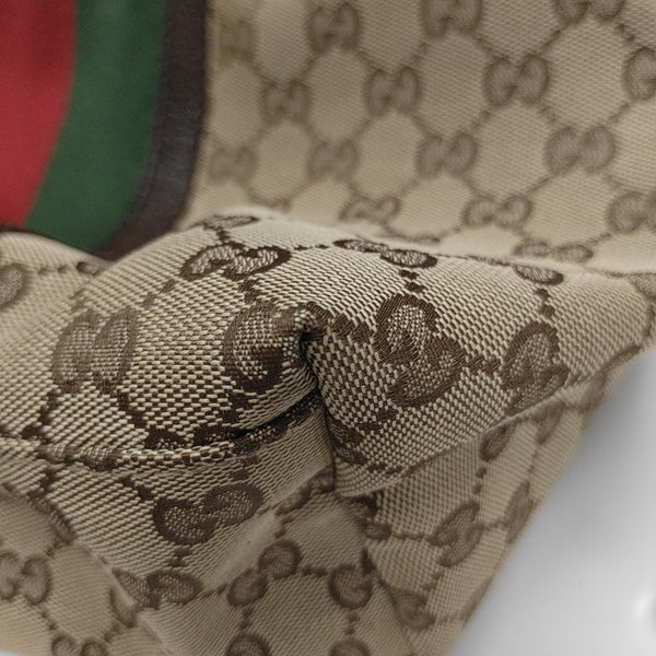 Signature Monogram Canvas Brown