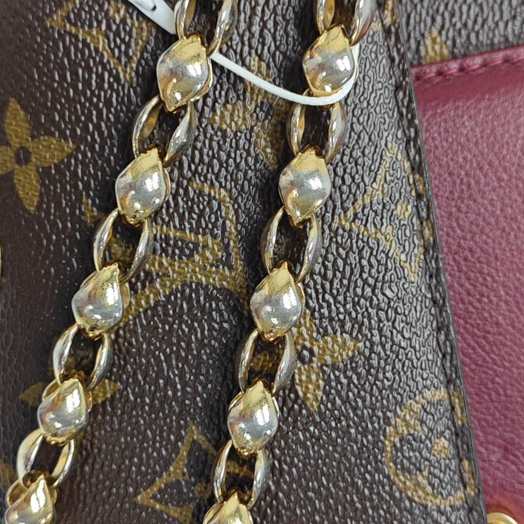 VICTOIRE Monogram Coated Canvas Brown